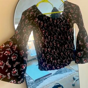 Off the shoulder bell sleeved shirt